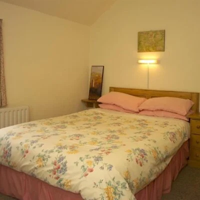 An Creagán (2 bedroom) – Crockmacann - bedroom double bed with bedside table