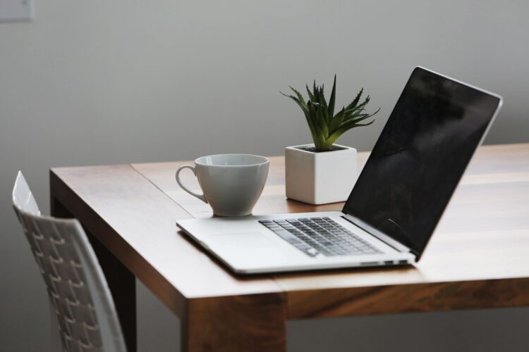 Generic image with laptop on table